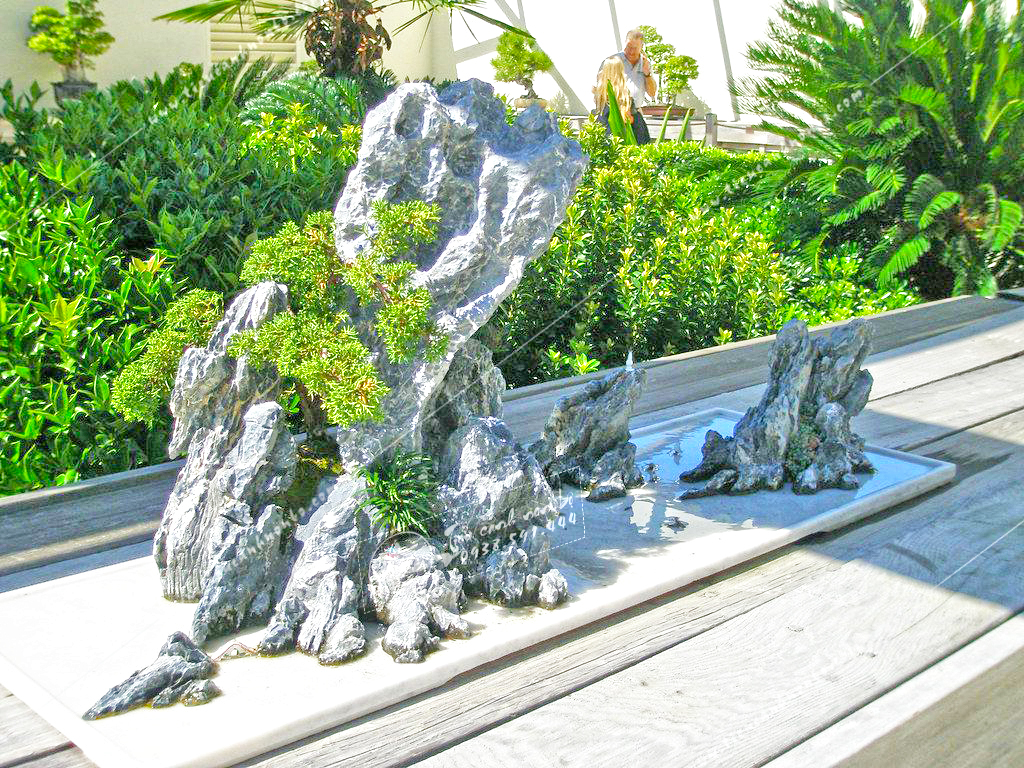 nhung-cach-su-dung-hon-non-bo-mini-de-ban-hop-phong-thuy-ma-rat-it-nguoi-biet Những cách sử dụng hòn non bộ mini để bàn hợp phong thủy mà rất ít người biết
